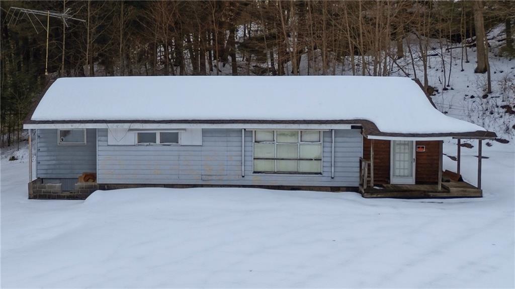 169 Glenview Road Somerset, PA 15501 - Photo 4 of 17 a view of a house with a yard