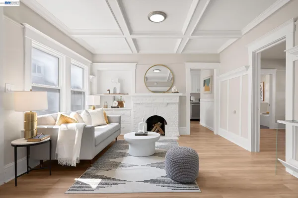 a living room with furniture a window and a table