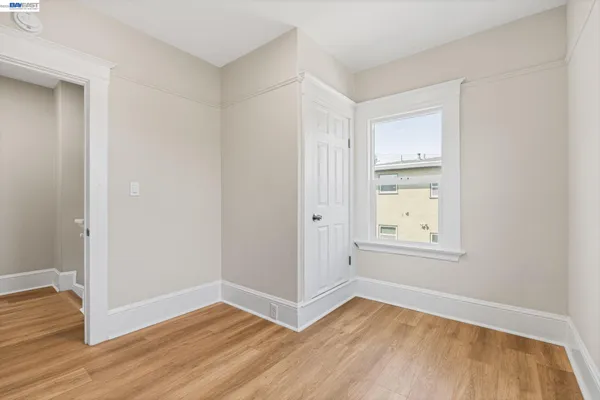 a view of entryway with wooden floor