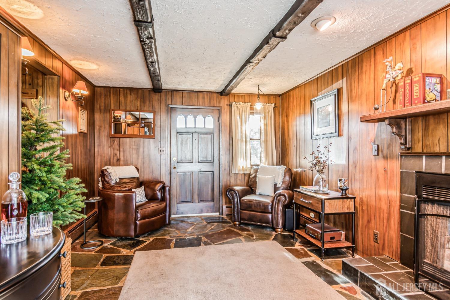 25 Simpson Avenue Edison, NJ 08817 - Photo 13 of 25 a living room with furniture a flat screen tv and a window