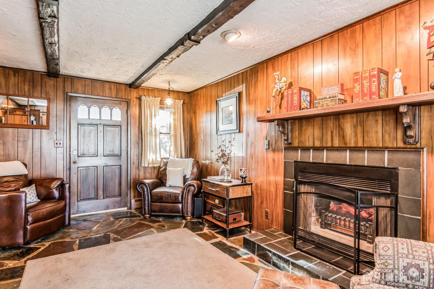 25 Simpson Avenue Edison, NJ 08817 - Photo 14 of 25 a living room with furniture a flat screen tv and floor to ceiling window