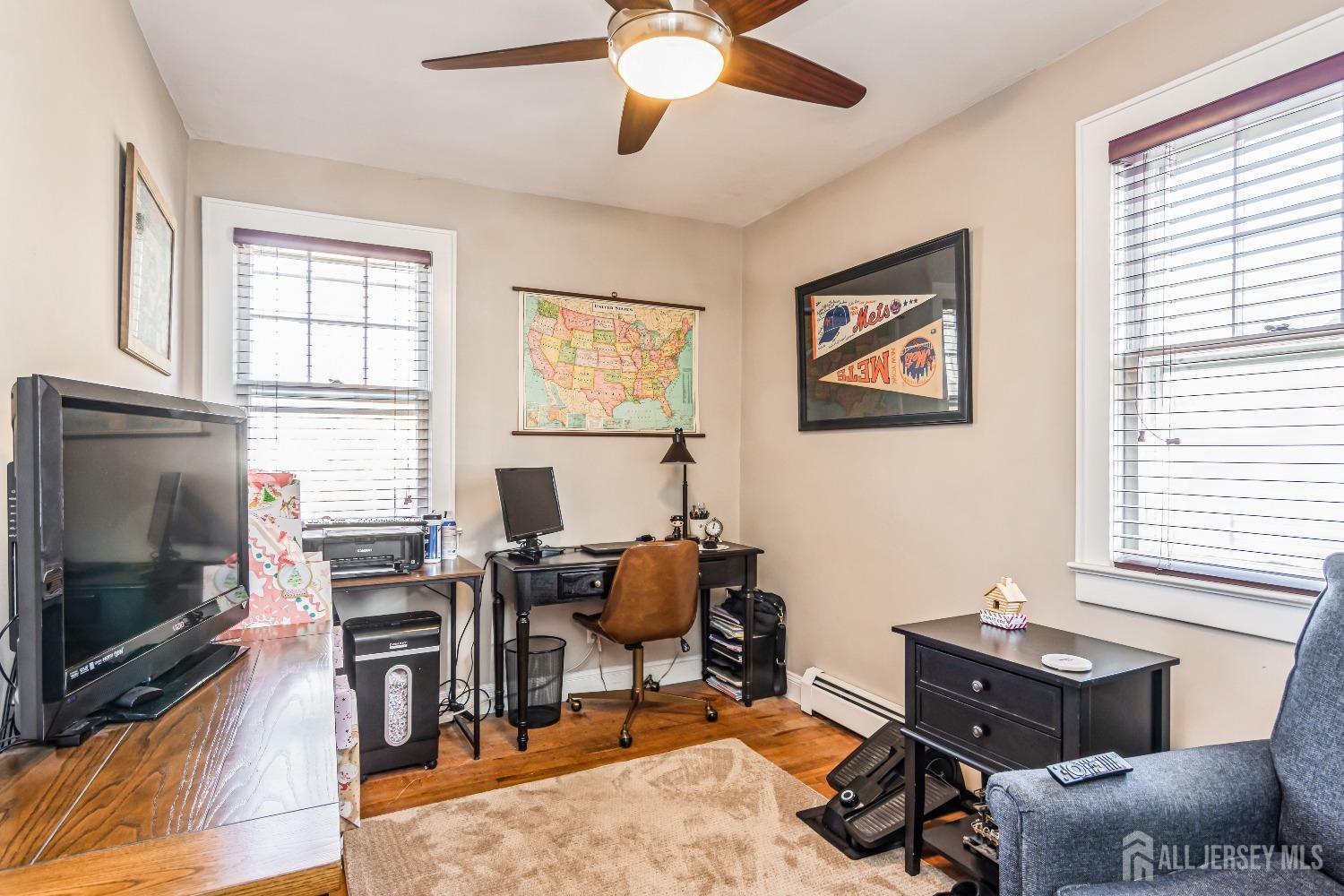 25 Simpson Avenue Edison, NJ 08817 - Photo 17 of 25 a livingroom with workspace and a window