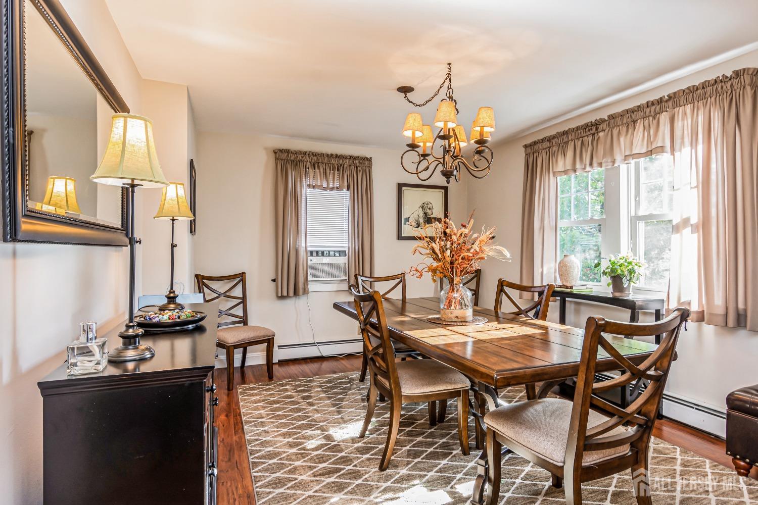 25 Simpson Avenue Edison, NJ 08817 - Photo 2 of 25 a view of a dining room with furniture and a chandelier