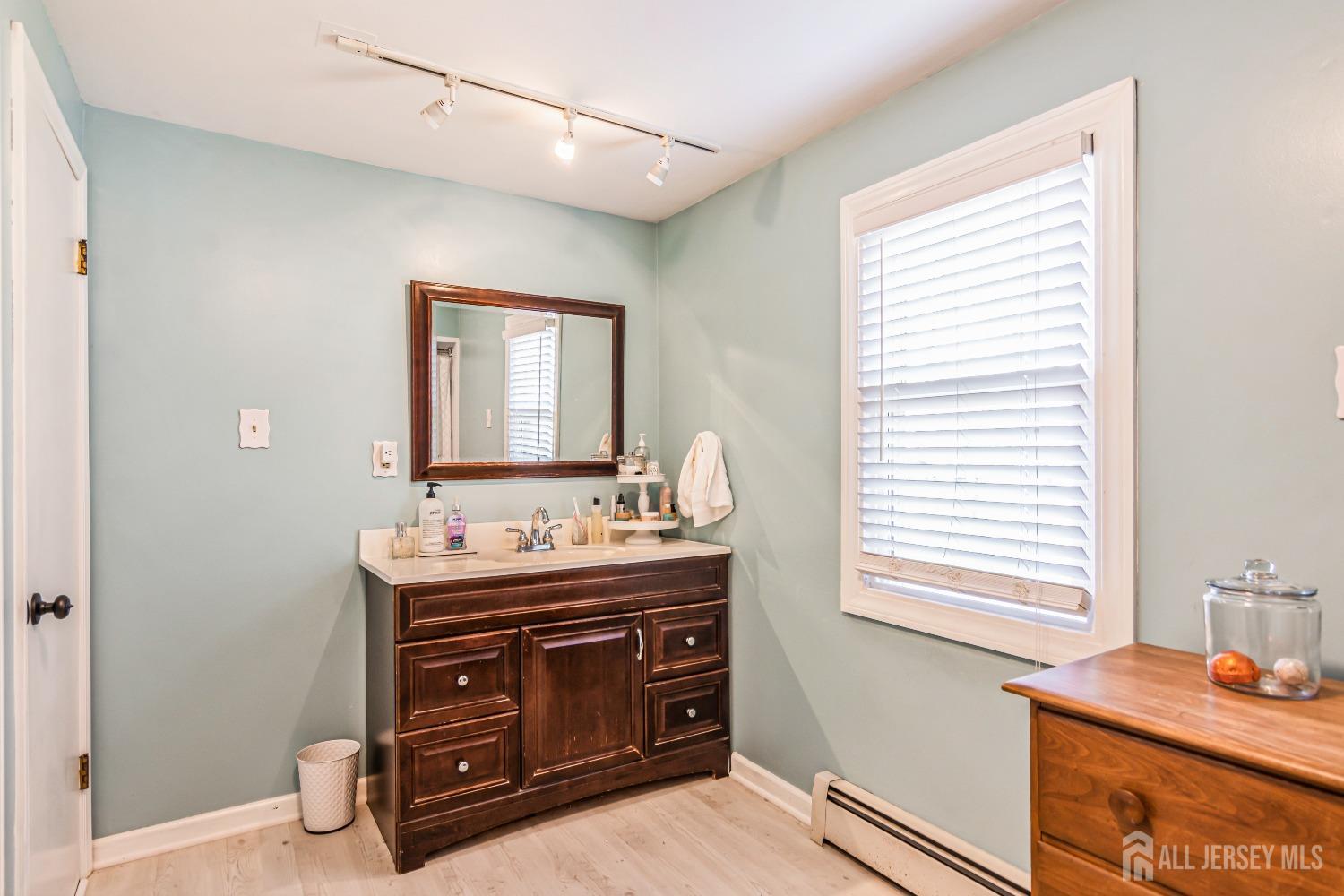 25 Simpson Avenue Edison, NJ 08817 - Photo 21 of 25 a room with a bed and a window