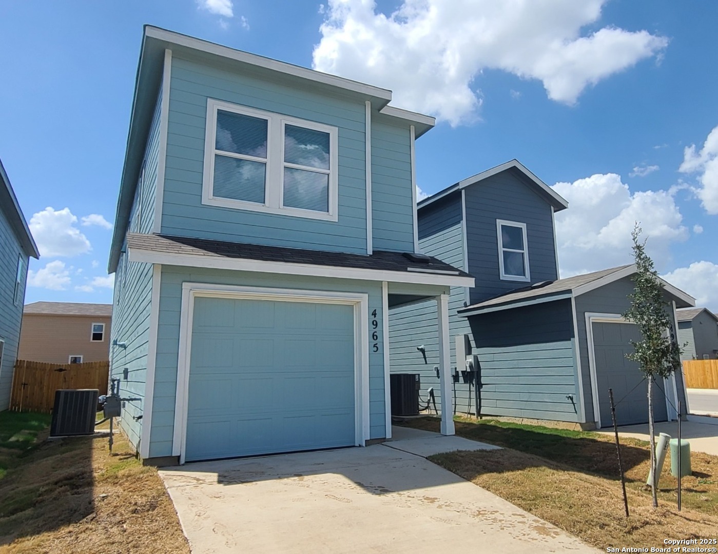 4965 Daisy Blossom Converse, TX 78109 - Photo 1 of 23 a front view of a house