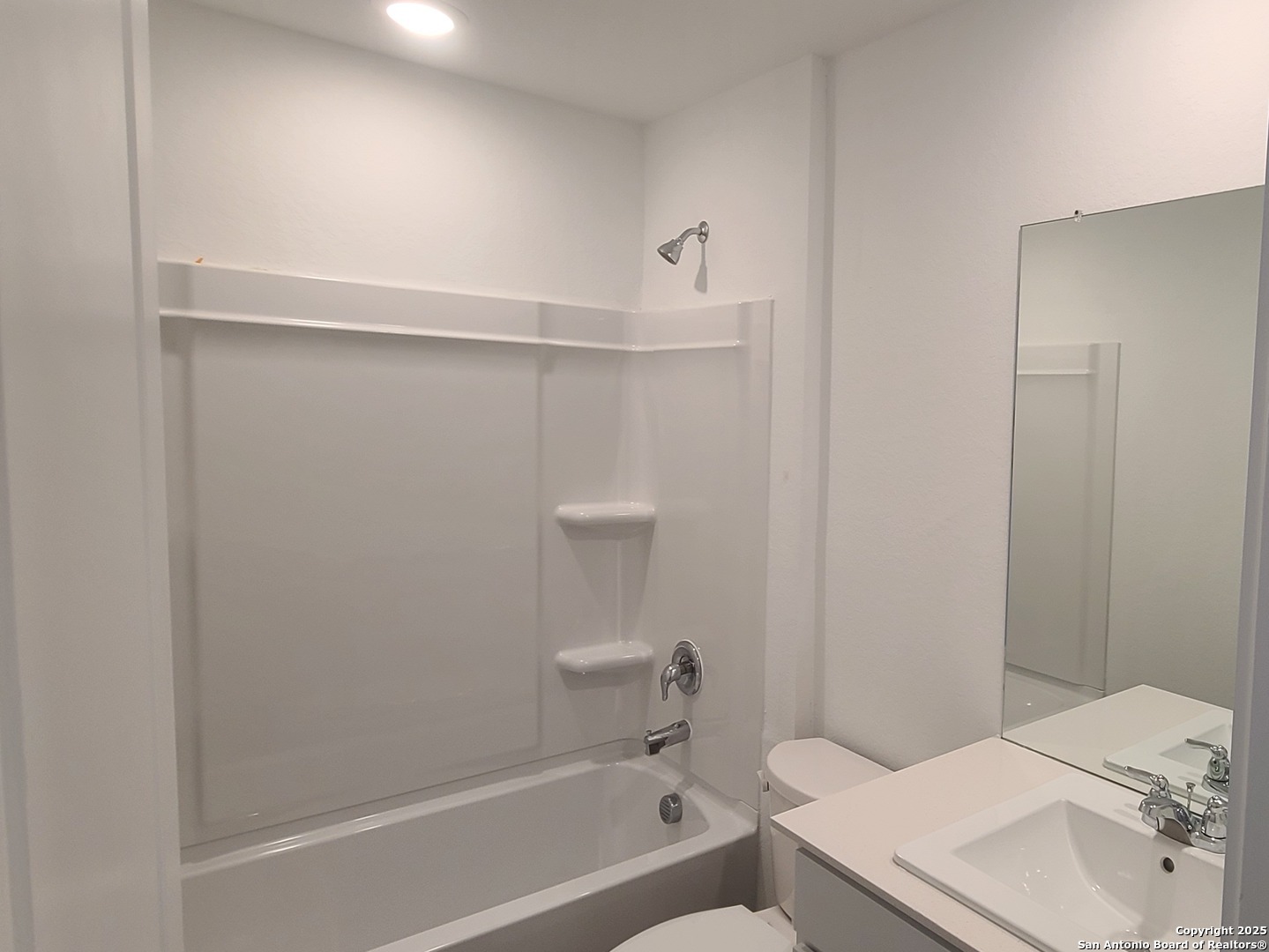 4965 Daisy Blossom Converse, TX 78109 - Photo 16 of 23 a bathroom with a sink a toilet and shower