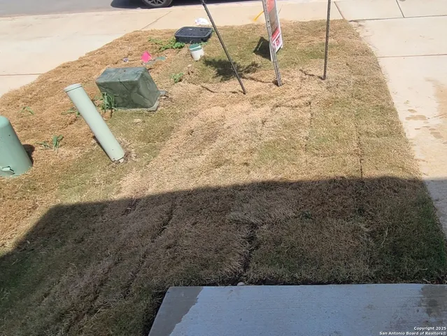 a front view of a house with a garage