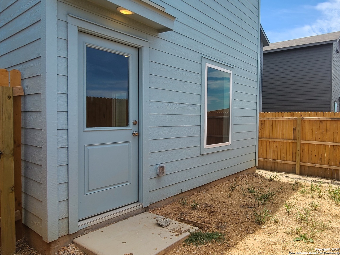 4965 Daisy Blossom Converse, TX 78109 - Photo 22 of 23 a view of front door of a house