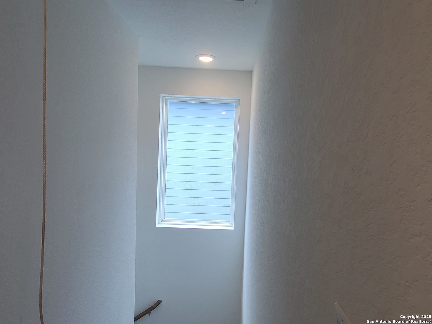 4965 Daisy Blossom Converse, TX 78109 - Photo 10 of 23 a view of an empty room with a window