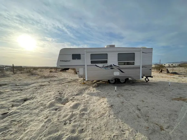 a room with furniture and a flat screen tv