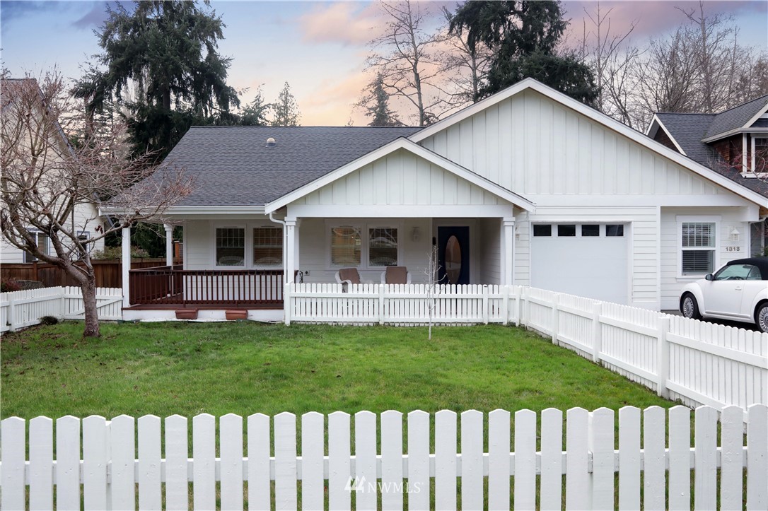 1813 Watkins Road Freeland, WA 98249 - Photo 1 of 29 a view of a white house with a big yard and potted plants
