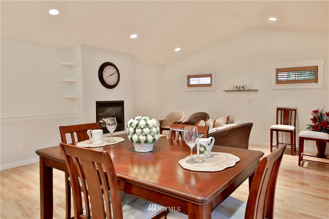 1813 Watkins Road Freeland, WA 98249 - Photo 8 of 29 a view of a dining room with furniture and wooden floor