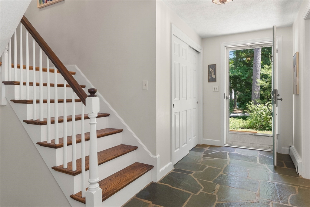 73 High Ridge Road Boxford, MA 01921 - Photo 19 of 39 a view of entryway with wooden floor and stairs