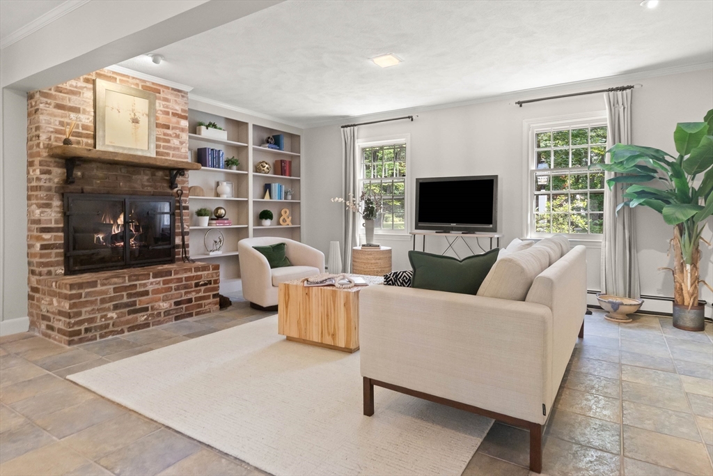 73 High Ridge Road Boxford, MA 01921 - Photo 3 of 39 a living room with furniture and a flat screen tv
