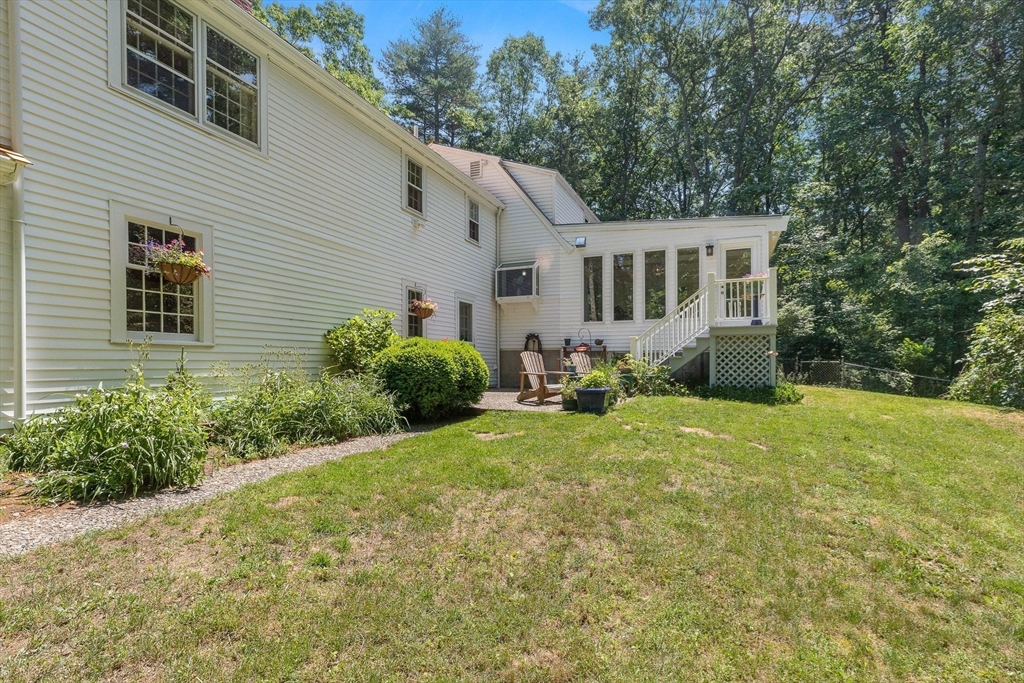 73 High Ridge Road Boxford, MA 01921 - Photo 33 of 39 a view of a house with backyard and garden