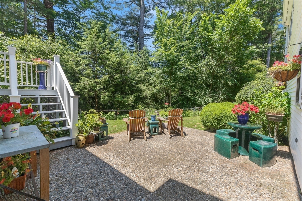 73 High Ridge Road Boxford, MA 01921 - Photo 34 of 39 a view of a chairs and table in the patio