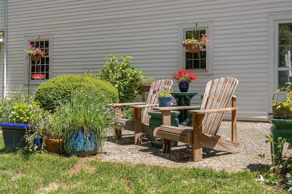 73 High Ridge Road Boxford, MA 01921 - Photo 35 of 39 a view of backyard with outdoor seating and plants