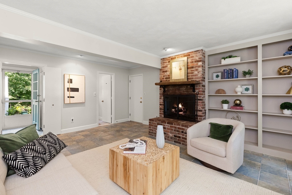 73 High Ridge Road Boxford, MA 01921 - Photo 5 of 39 a living room with furniture and a fireplace