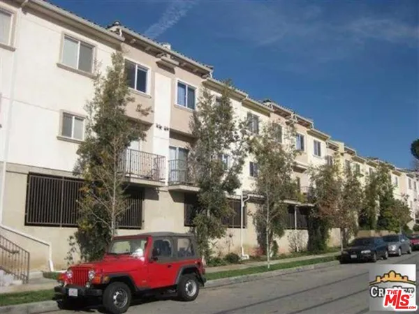 a car parked in front of a building