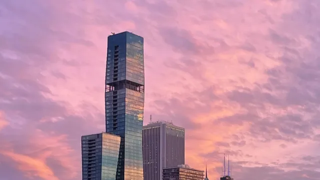 a kitchen with a refrigerator and a stove