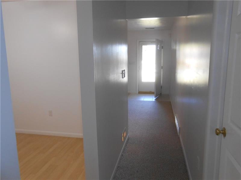 304 3rd Street Butler, PA 16001 - Photo 15 of 20 Hallway kitchen to living room