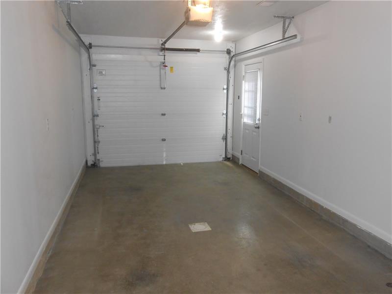 304 3rd Street Butler, PA 16001 - Photo 17 of 20 One stall garage with drain, man door.