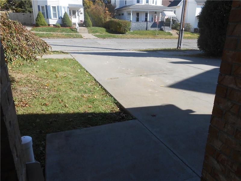 304 3rd Street Butler, PA 16001 - Photo 20 of 20 Concrete driveway and sidewalk entry.