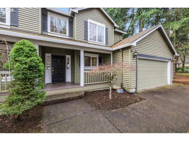 a view of backyard of a house