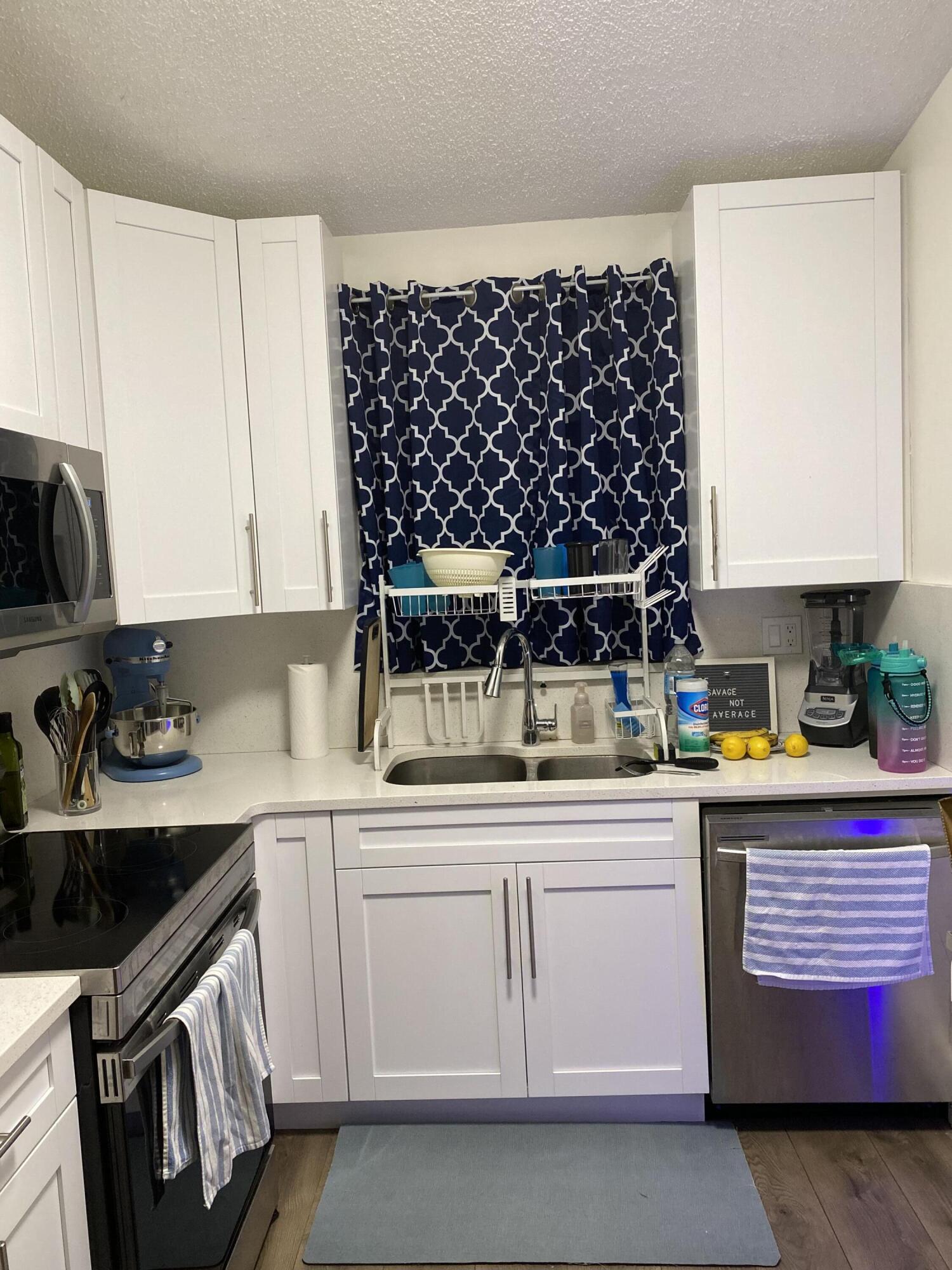 2900 Olivewood Terrace, Unit 2060 Boca Raton, FL 33431 - Photo 6 of 12 kitchen 2