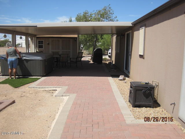 1130 South Wickiup Road Apache Junction, AZ 85119 - Photo 3 of 19 back patio and walk way