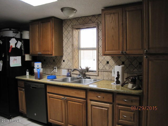 1130 South Wickiup Road Apache Junction, AZ 85119 - Photo 6 of 19 kitchen
