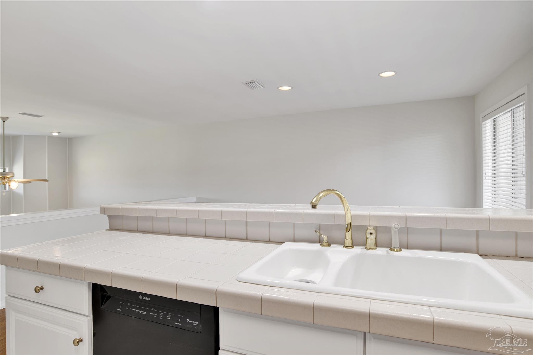 13414 Valerie Drive Pensacola, FL 32507 - Photo 17 of 35 a bathroom with a sink and a window