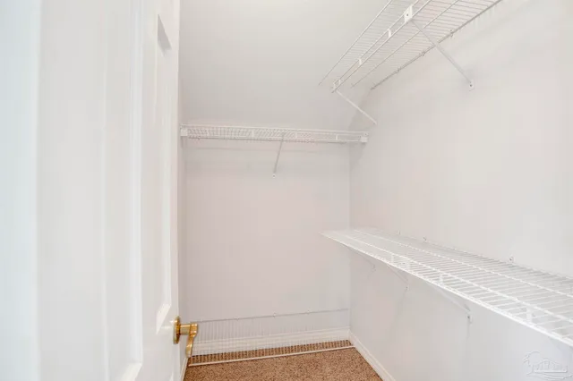 a view of small space with racks on the wall