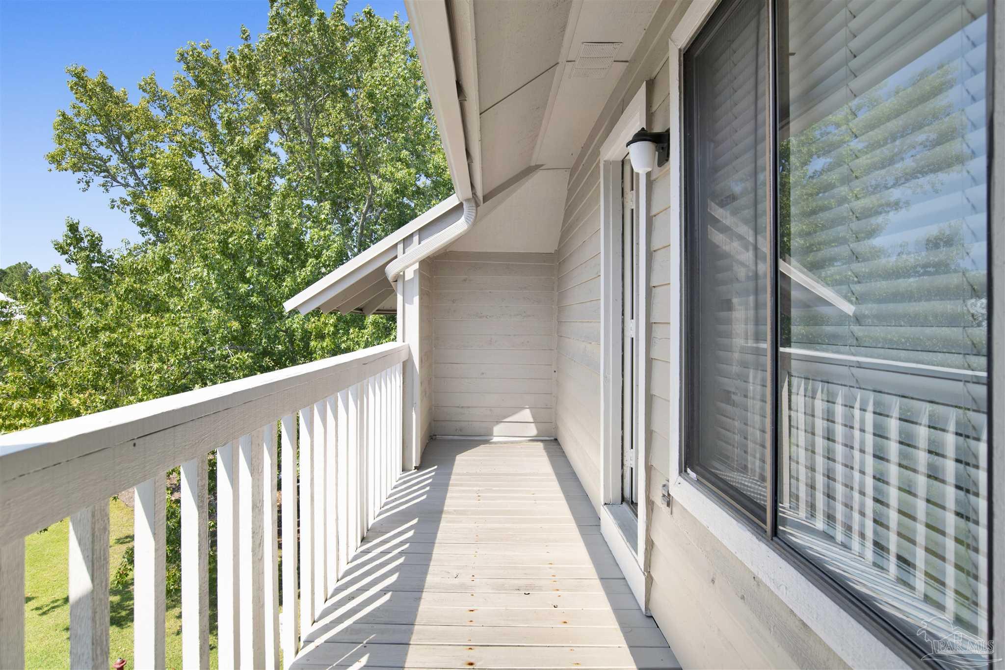 13414 Valerie Drive Pensacola, FL 32507 - Photo 26 of 35 a view of a balcony with wooden floor