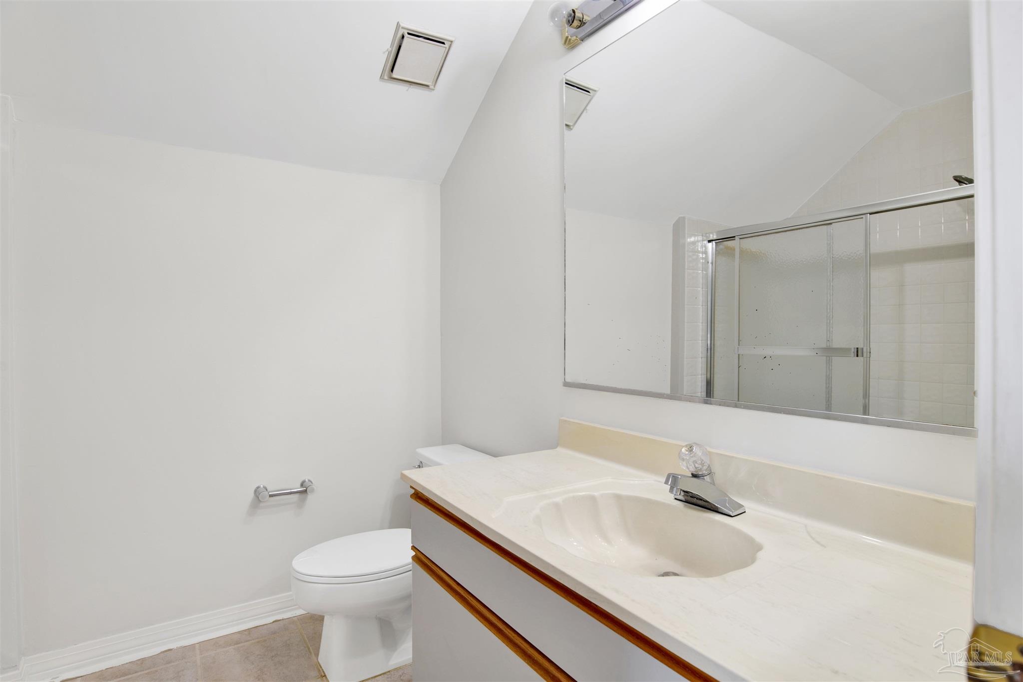 13414 Valerie Drive Pensacola, FL 32507 - Photo 27 of 35 a bathroom with a sink and a toilet