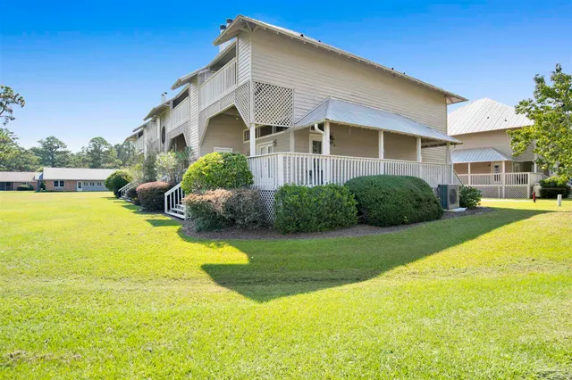 a view of a house with a swimming pool