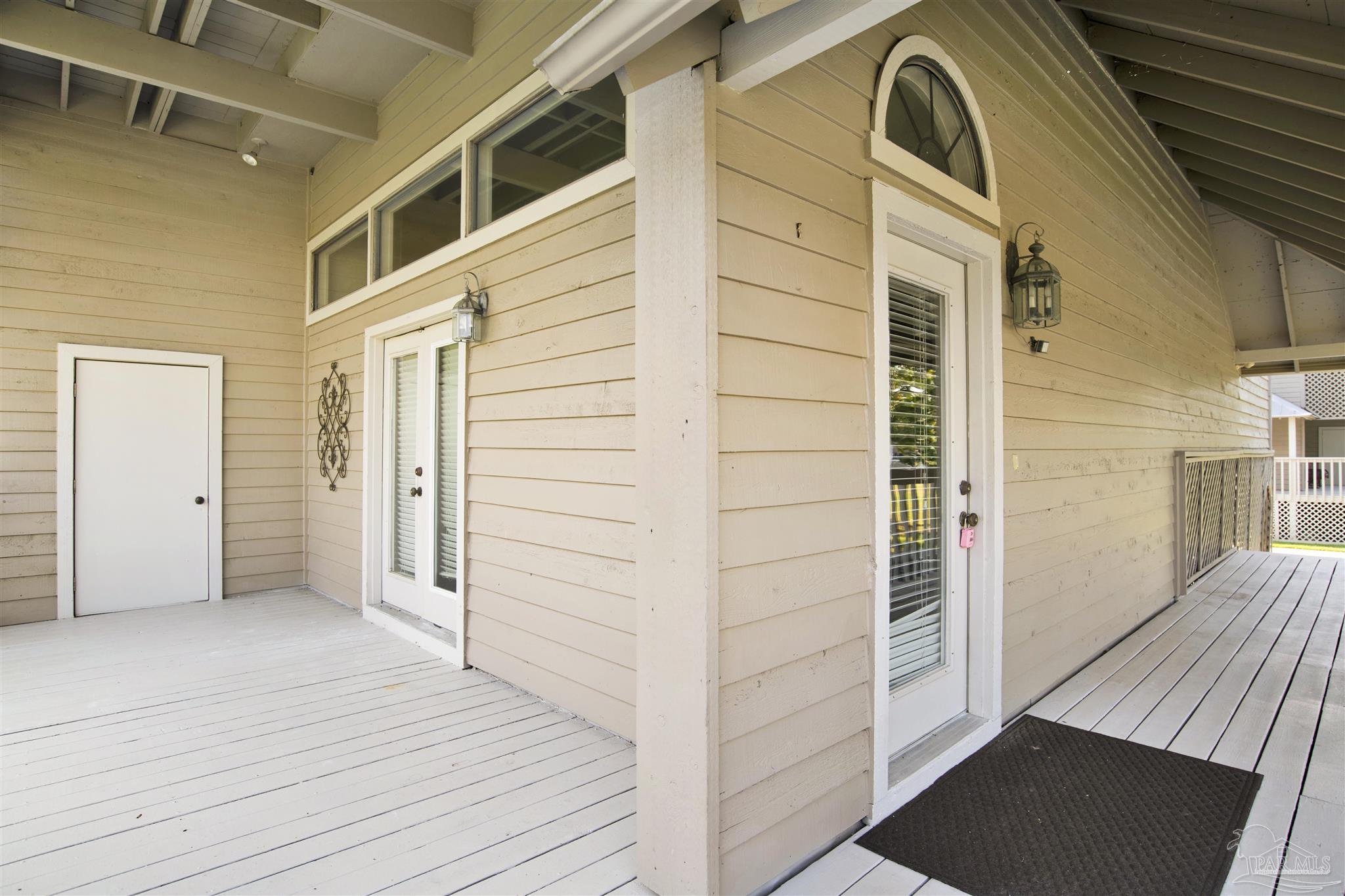 13414 Valerie Drive Pensacola, FL 32507 - Photo 6 of 35 a view of a hallway with wooden floor