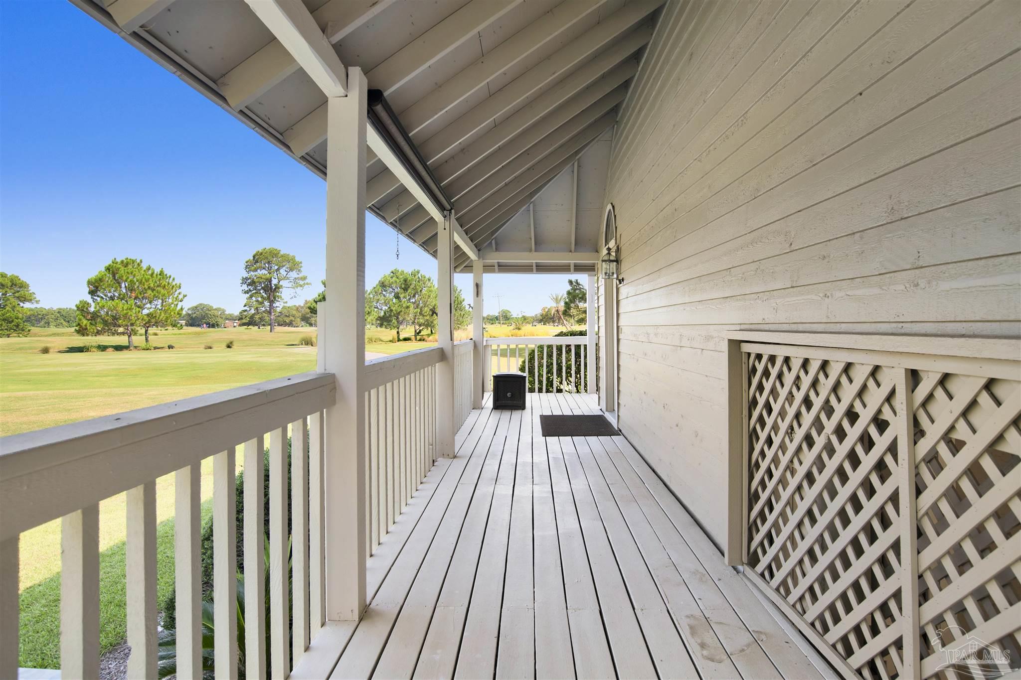 13414 Valerie Drive Pensacola, FL 32507 - Photo 9 of 35 a view of a balcony with wooden floor