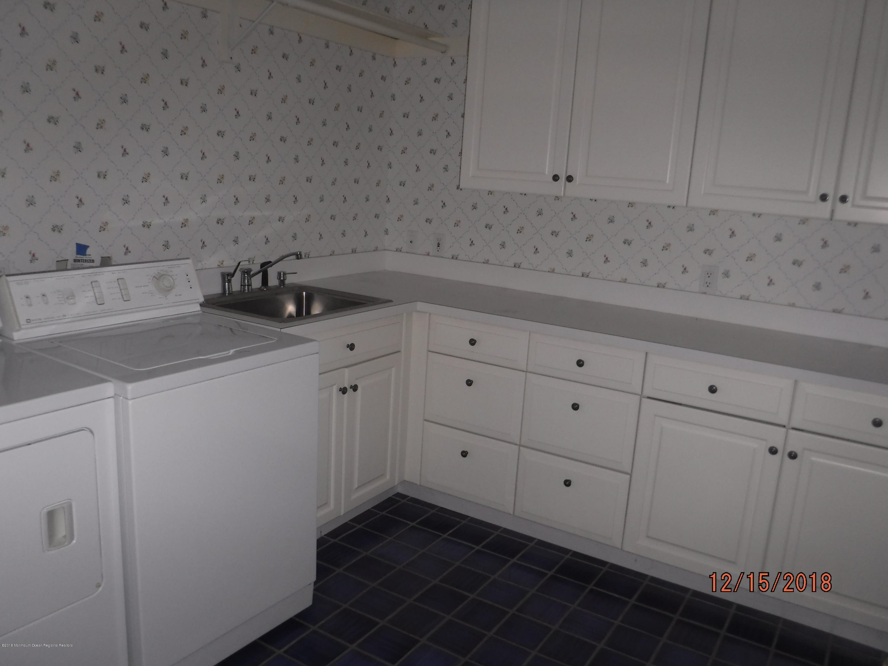 23 Paddock Lane Colts Neck, NJ 07722 - Photo 41 of 64 Laundry room