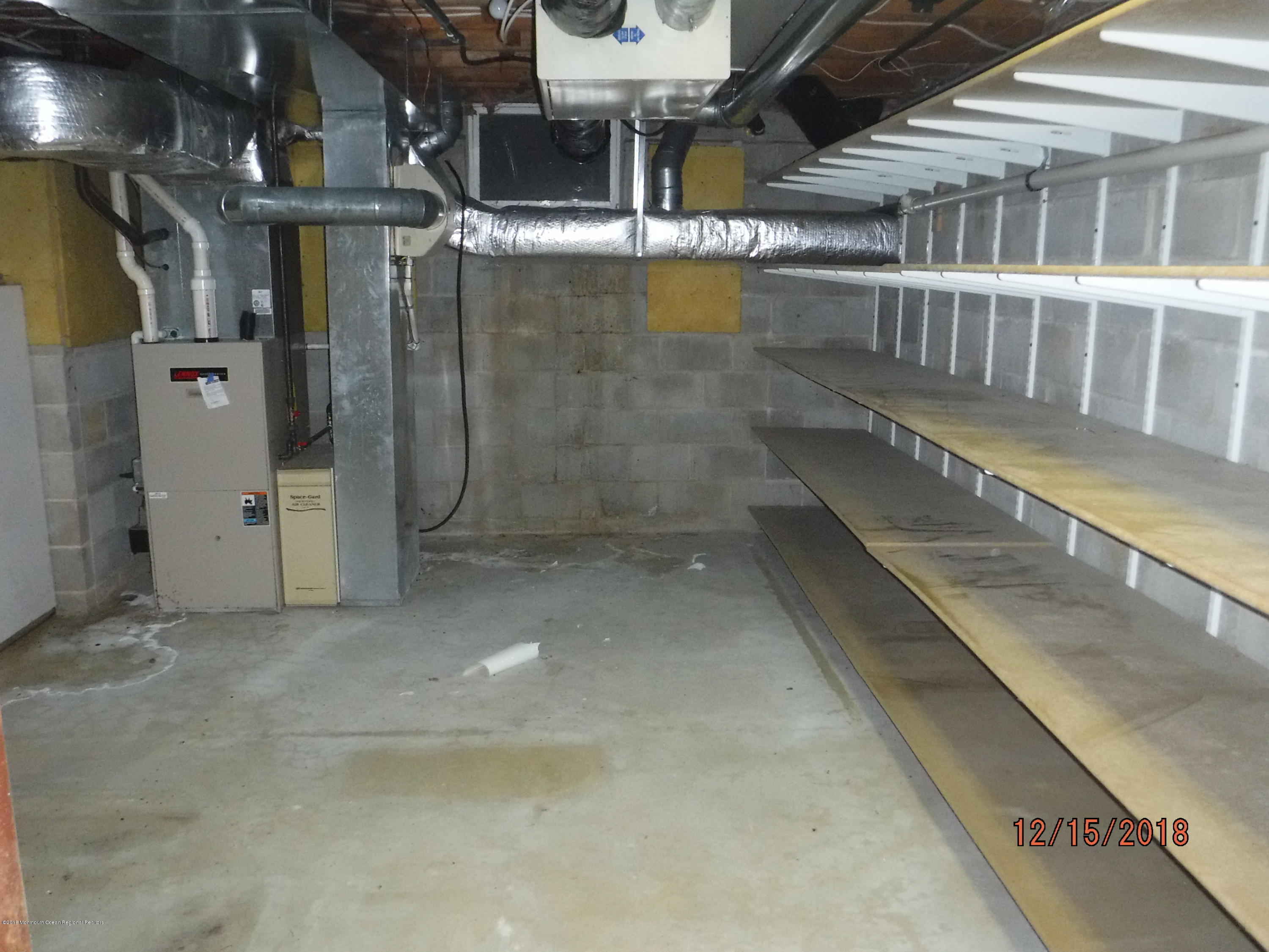 23 Paddock Lane Colts Neck, NJ 07722 - Photo 47 of 64 basement unfinished area view 3