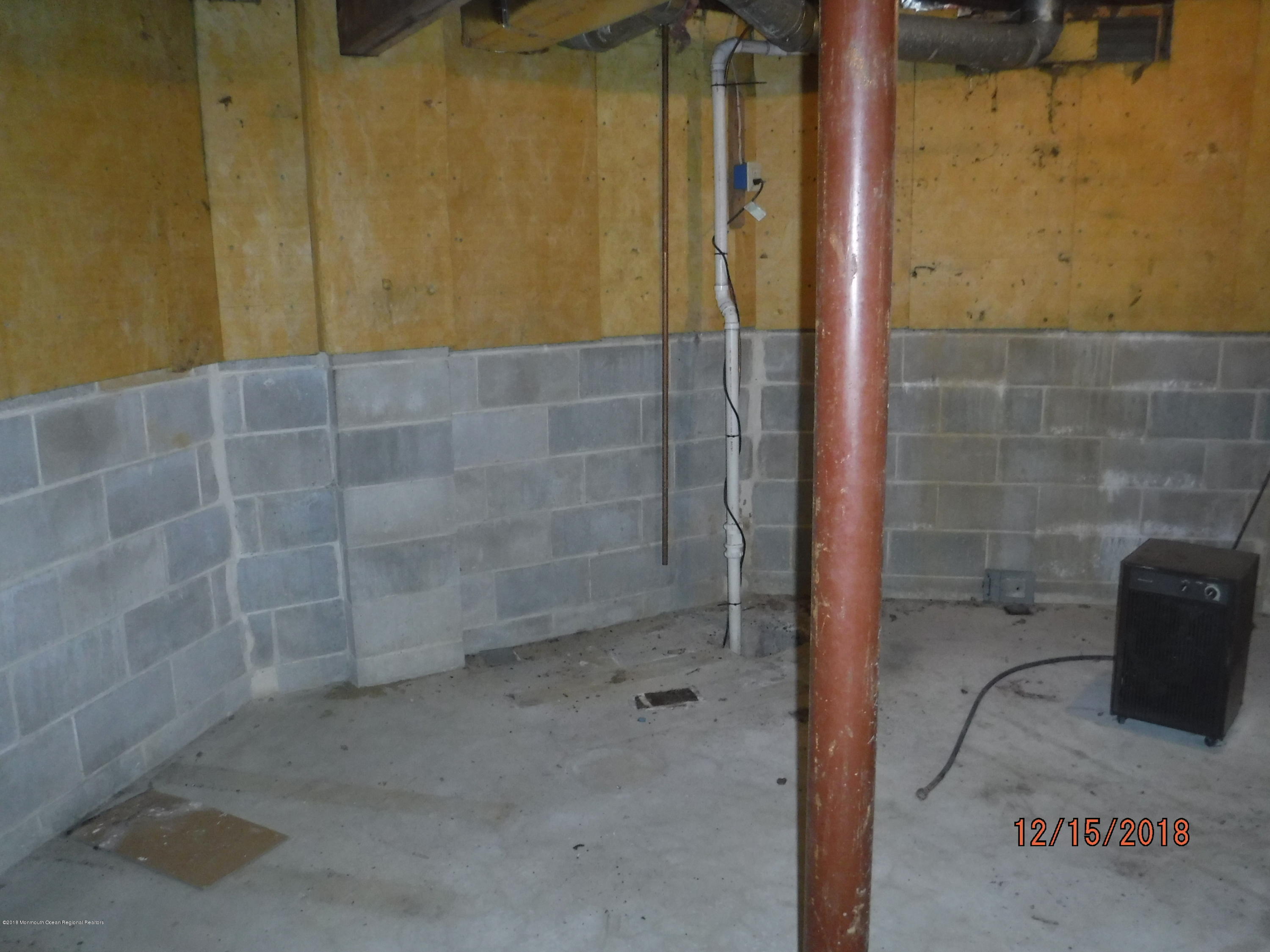 23 Paddock Lane Colts Neck, NJ 07722 - Photo 48 of 64 basement unfinished area view 4