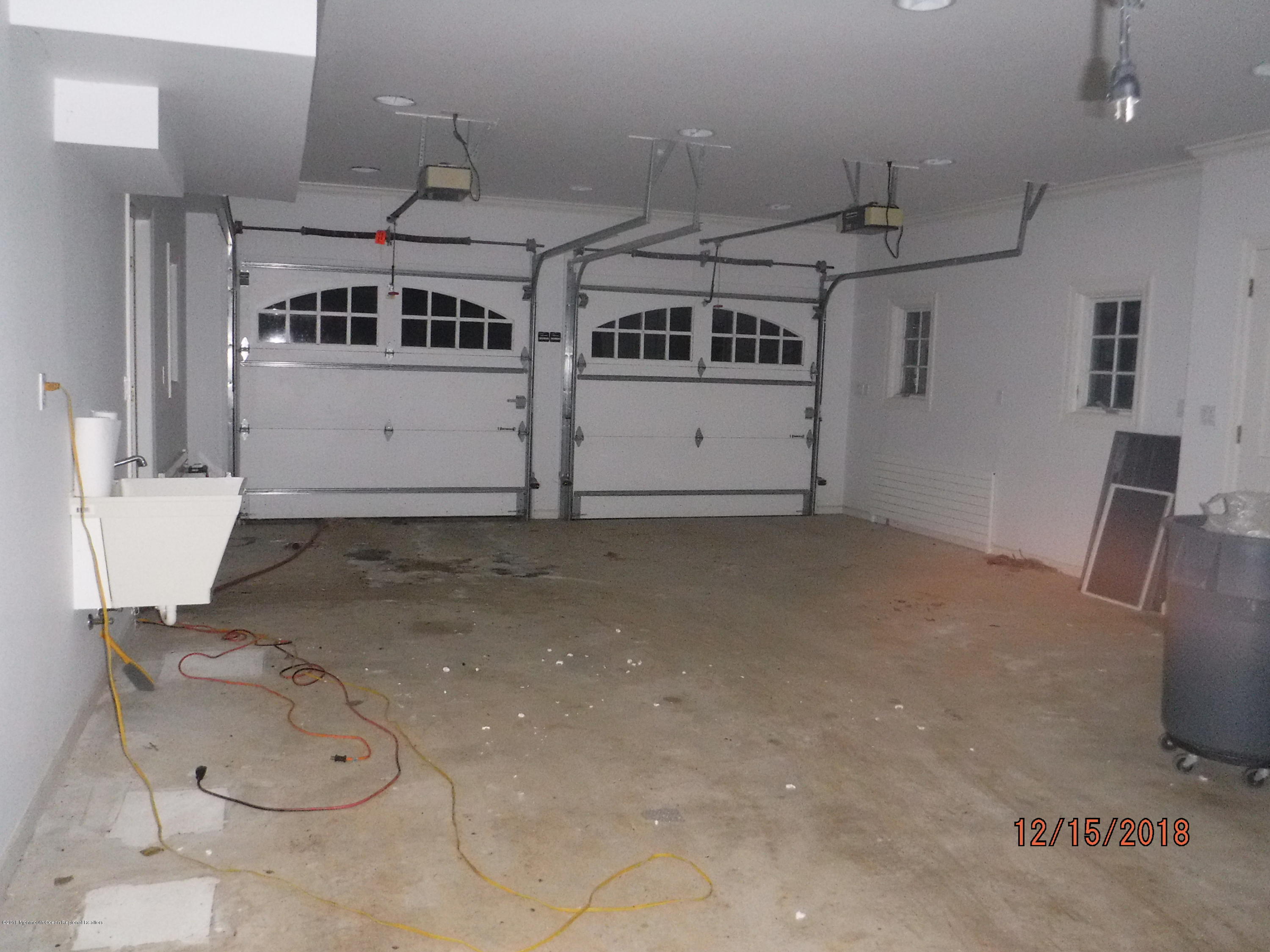 23 Paddock Lane Colts Neck, NJ 07722 - Photo 52 of 64 carriage house garage interior