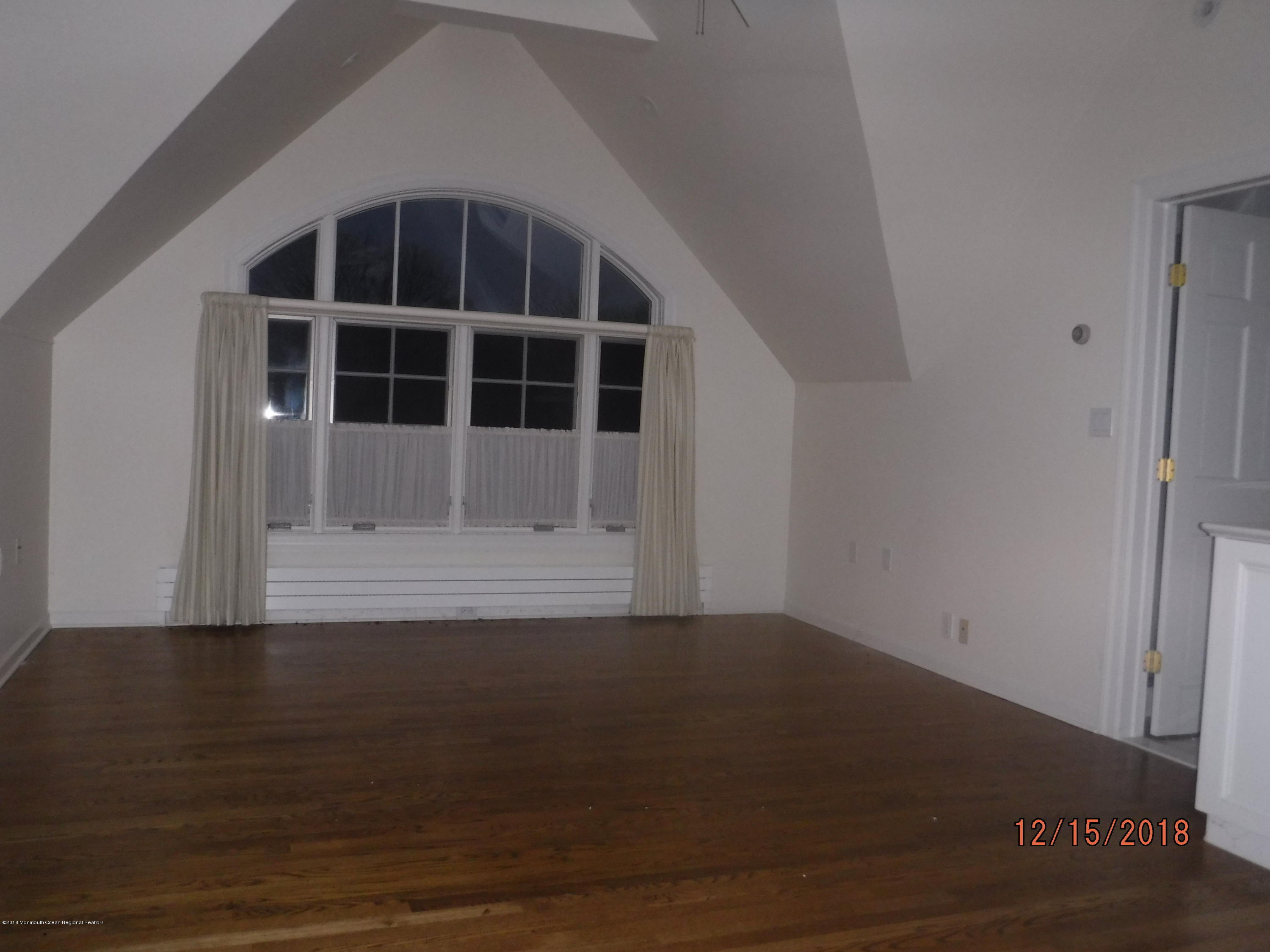 23 Paddock Lane Colts Neck, NJ 07722 - Photo 59 of 64 Illegal apt living room