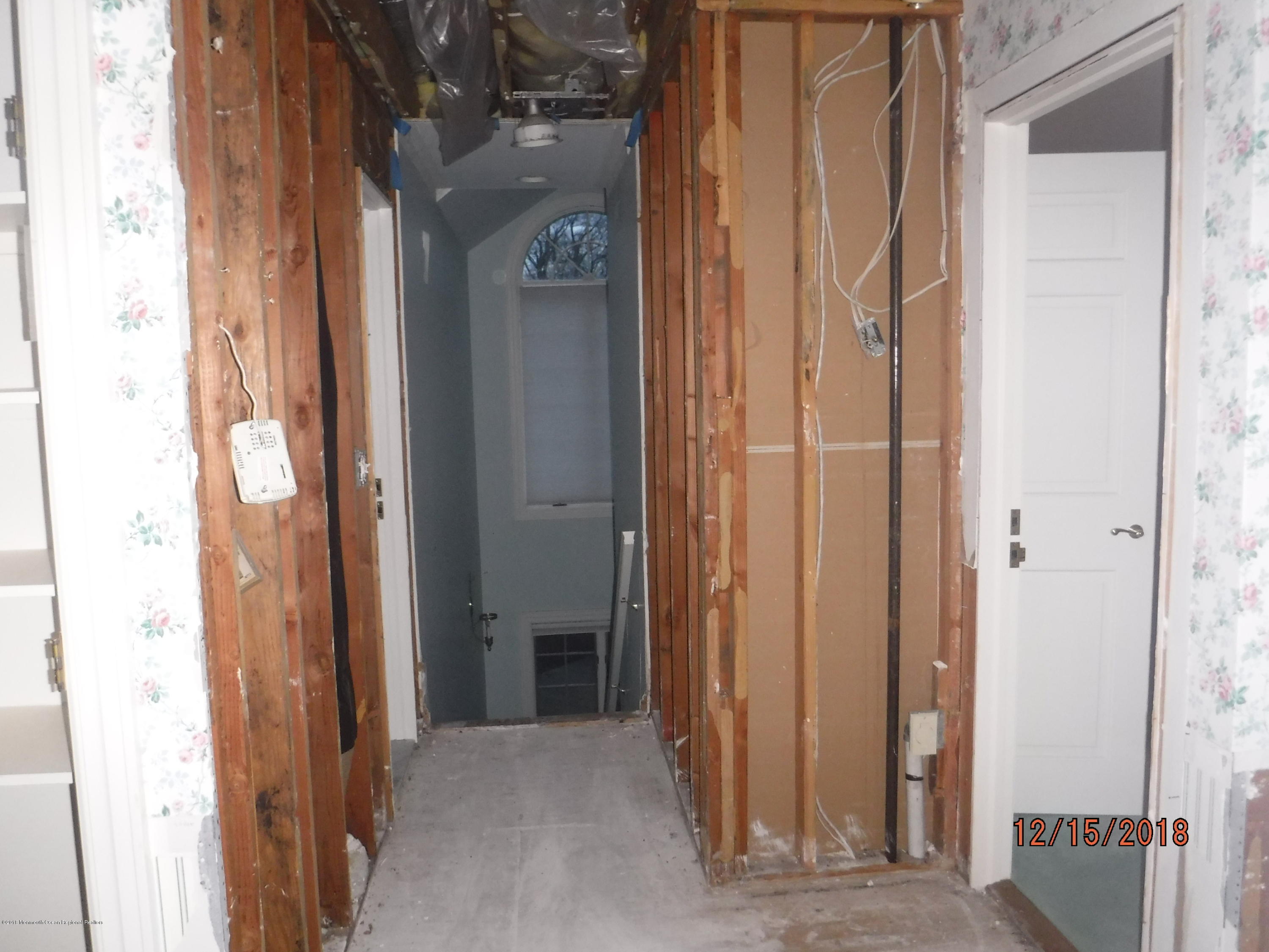 23 Paddock Lane Colts Neck, NJ 07722 - Photo 61 of 64 Upper level with missing sheetrock