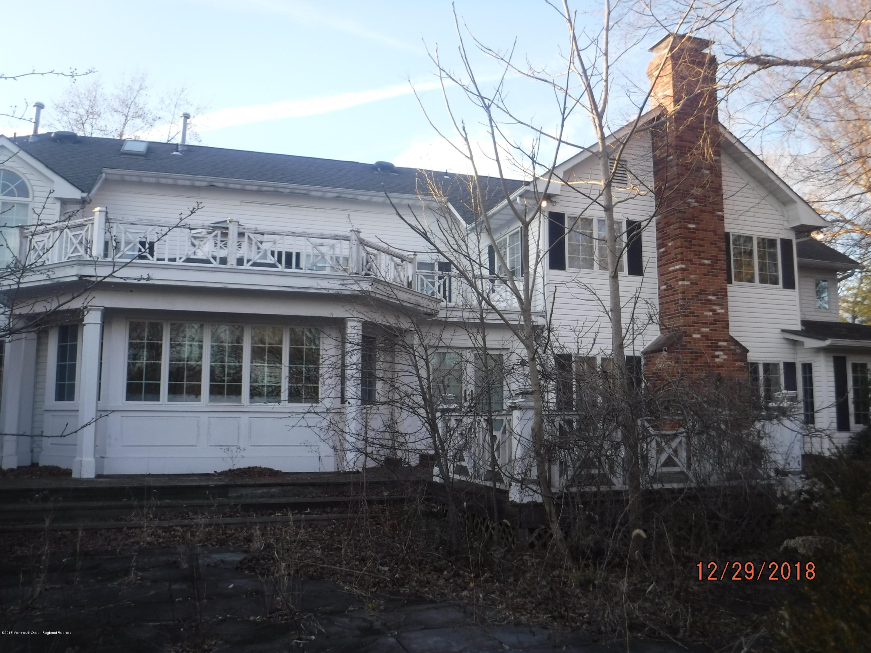 23 Paddock Lane Colts Neck, NJ 07722 - Photo 64 of 64 rear