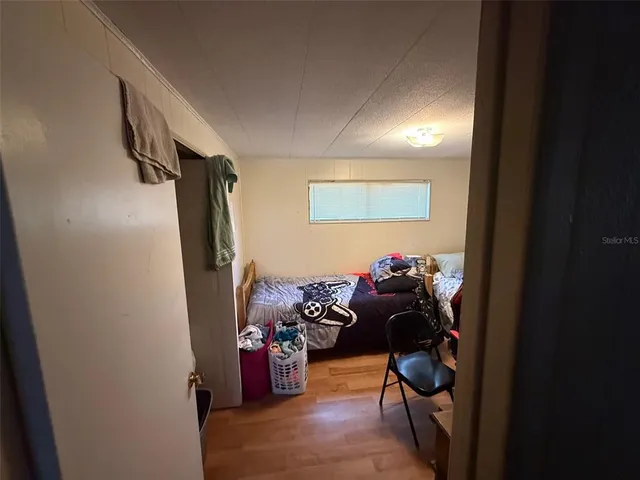 a room with furniture and flat screen tv