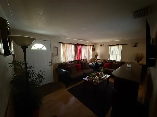 a backyard of a house with lots of green space