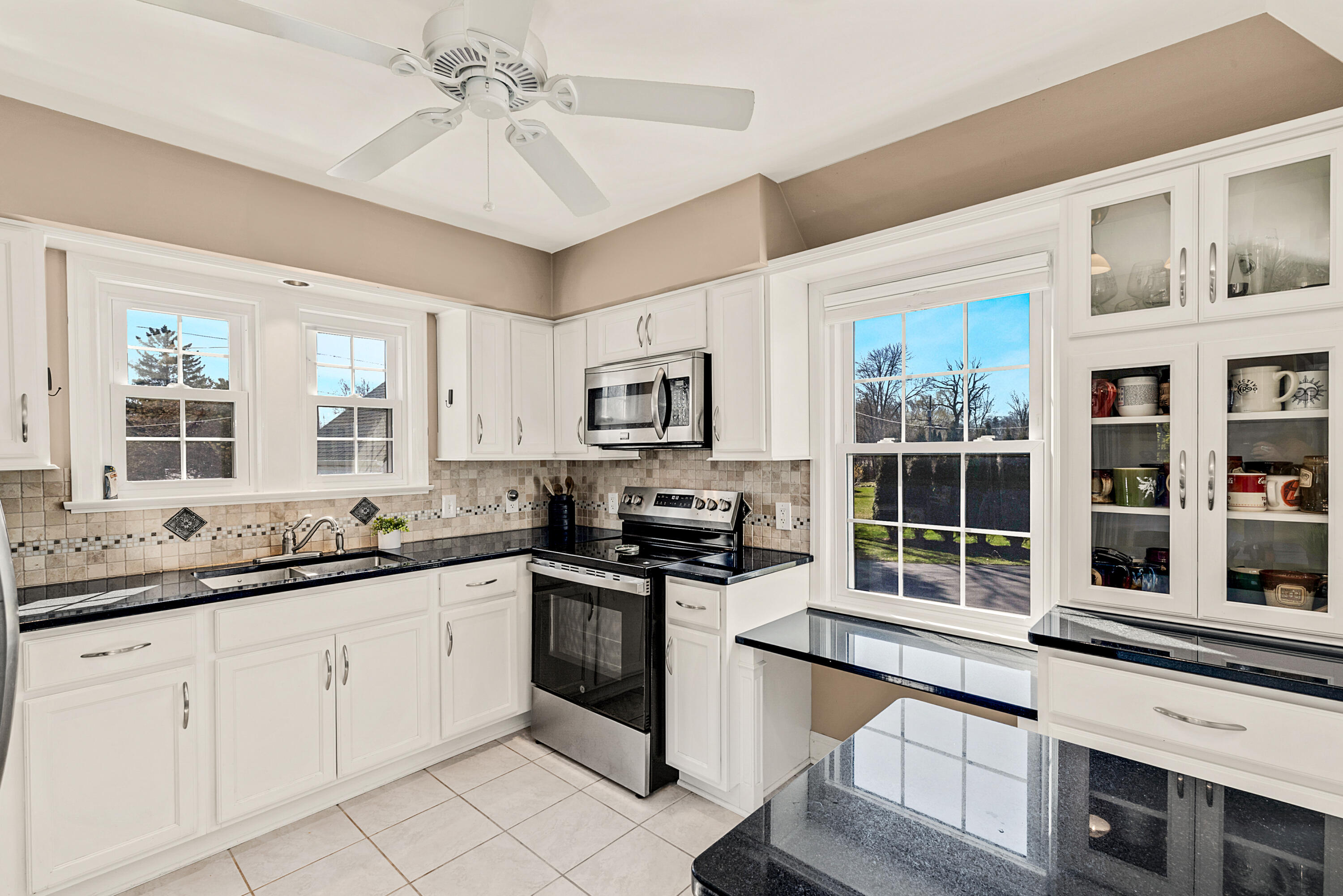 8550 North Regent Road Fox Point, WI 53217 - Photo 7 of 24 The kitchen let's in so much natural light!