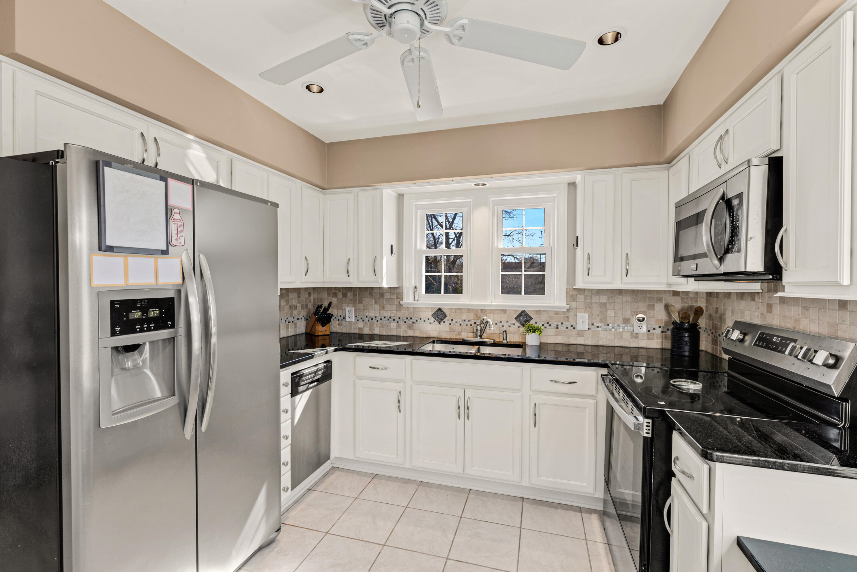 8550 North Regent Road Fox Point, WI 53217 - Photo 8 of 24 Hallway entrance is to left of fridge