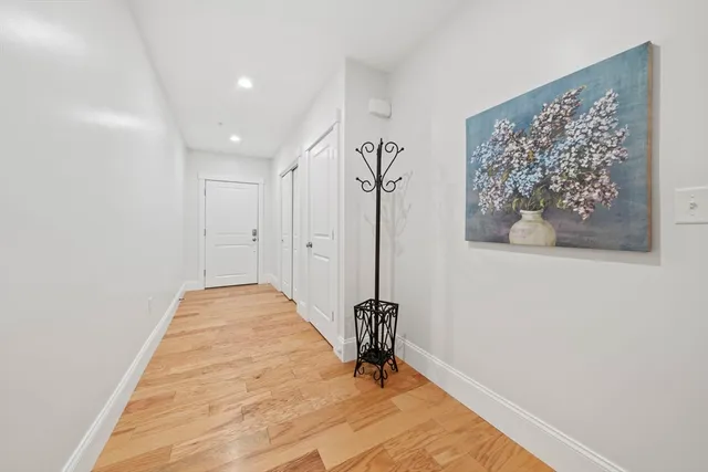 a bed room with a bed and a chair